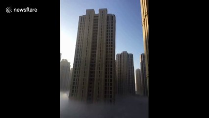 Heavy fog creates a 'sea of clouds' in northern China