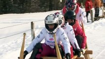 Bavarians race down snowy slopes on horned sleds