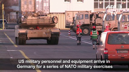 US soldiers and military equipment lands in Germany