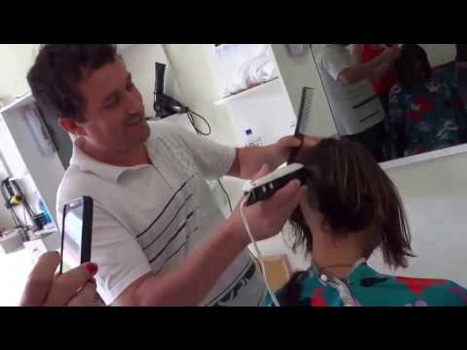 Woman headshave in a foreign salon