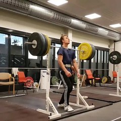 Guy Does Squats With His Collar Bones