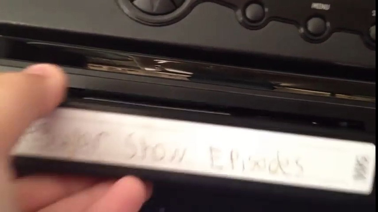 Putting a VHS tape in and ejecting the VHS tape from the Magnavox VCR