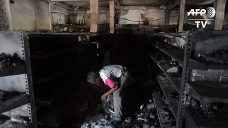 Stores left looted, burned after weekend of unrest in Venezuela