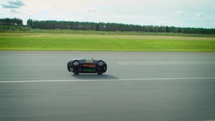 En voiture, à plus de 186 km/h sur deux roues ...