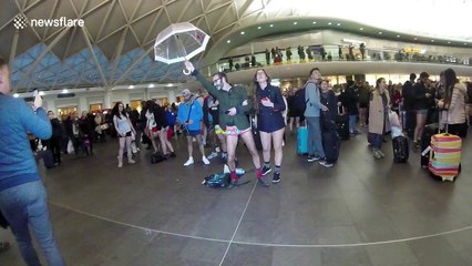 Commuters undress for the annual 'No Trousers on the Tube Day'