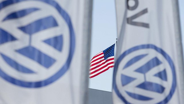 VW exec 'arrested in US', British drivers sue over emissions scandal