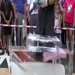 must watch this creative video how a man create a flower inside the slice of ice