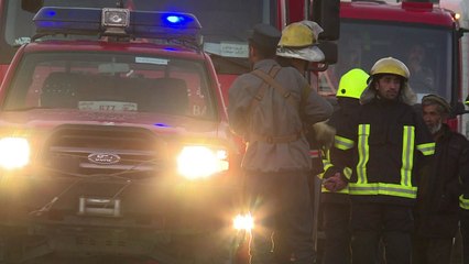Twin Taliban blasts near Afghan parliament kill dozens