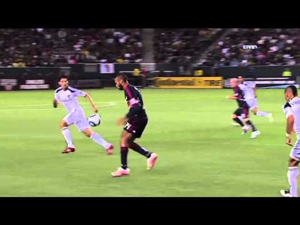 Thierry Henry juggles down the sideline