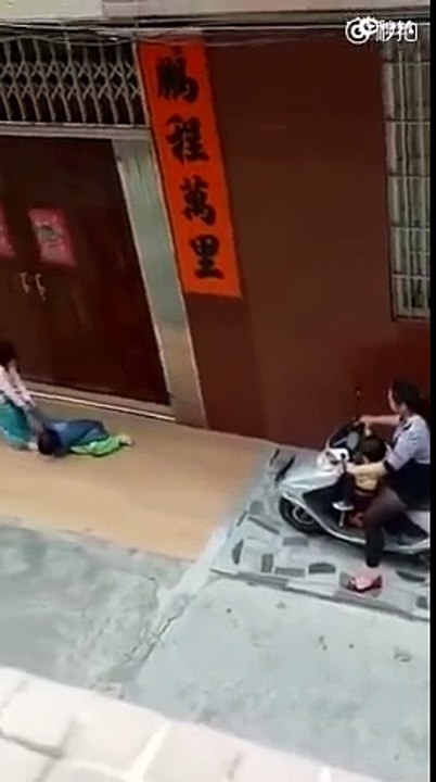 Woman on scooter captured on video deliberately running over helpless child's legs