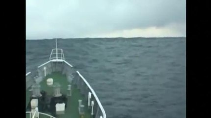 Ship passes through a Tsunami