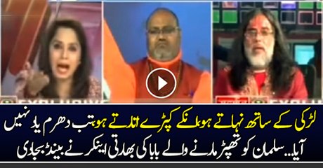 Journalist Bashing Om Swami in Live Show