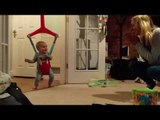 Adorable Toddler Jumps for Joy With Mother