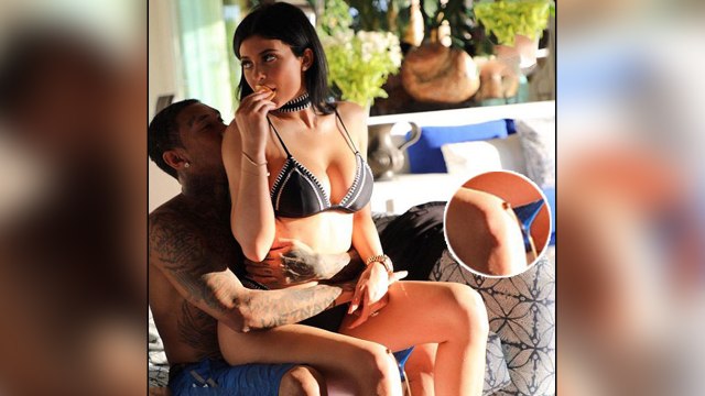 Kanye West Checks Out Kim Kardashian’s Butt While Fixing Her Outfit