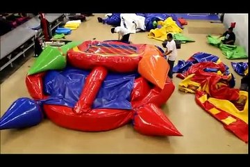 How to roll a Commercial Bounce House - Bouncer Depot