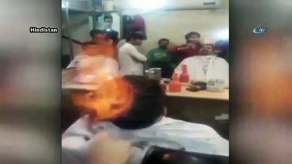 Çılgın berber müşterisinin saçını yaktı