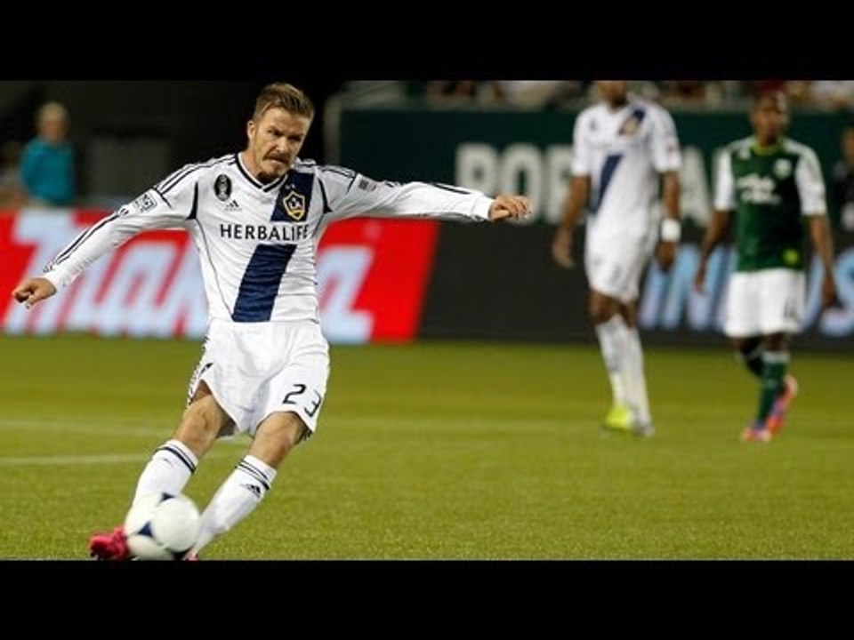 David Beckham curls in a signature free kick to give the Galaxy the lead over the Portland Timbers