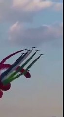 Airplanes making UAE flag in air with the  colorful smokes.