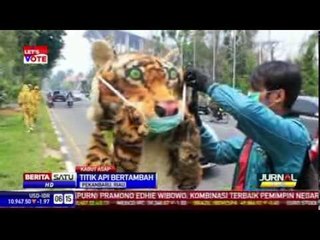"Harimau Sumatera" Bagikan Masker ke Warga Pekanbaru