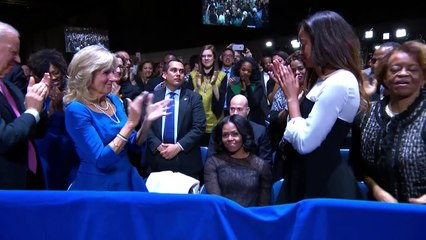 Obama tears up during tribute to Michelle, daughters