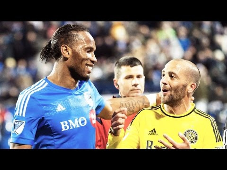 LEG LOCK: Didier Drogba ties up Goalkeeper Steve Clark