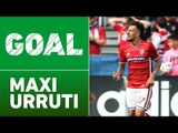 GOAL: Maxi Urruti chips his volley over Evan Bush