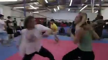girl fighting with boys