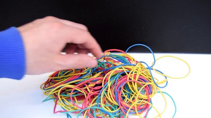 EXPERIMENT Glowing 1000 degree KNIFE VS Rubber Band Ball