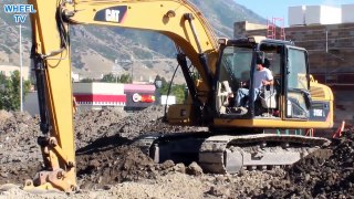 CAT 315C Excavator digging up close, construction machine