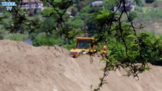 Bulldozer moving dirt, construction machine