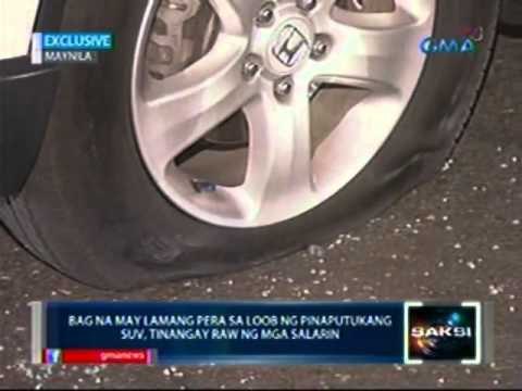 Saksi: EXCLUSIVE: Negosyante, patay nang holdapin at barilin sa Maynila (032312)