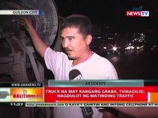 BT: Truck na may kargang graba,   tumagilid; nagdulot ng matinding   traffic