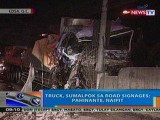 NTG: Truck, sumalpok sa road signages sa EDSA-QC; pahinante, naipit (051712)