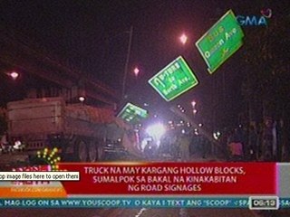 UB: Truck na may kargang hollow blocks, sumalpok sa bakal na kinakabitan ng road signages (051712)
