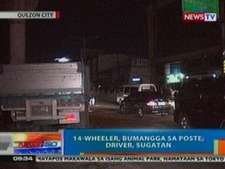 NTG: 14-wheeler, bumangga sa poste sa QC; driver, sugatan (051712)