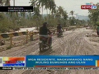 NTG: Mga residente ng New Bataan sa ComVal, nagkumahog nang muling bumohos ang ulan