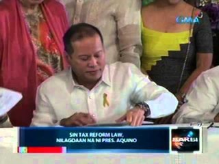 Saksi: Sin Tax Reform Law, nilagdaan na ni Pres. Aquino