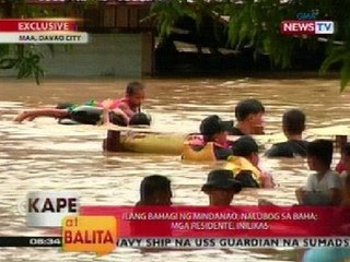 KB: Sa Davao, kinailangan pang gumamit ng truck para sagipin ang mga residenteng na-trap sa baha