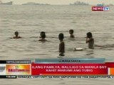 BT: Ilang pamilya, naliligo sa Manila Bay kahit marumi ang tubig