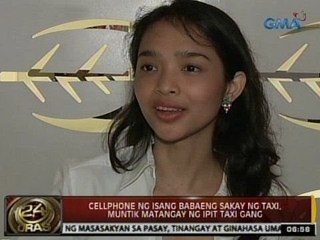 24Oras: Cellphone ng isang babaeng sakay ng taxi, muntik matangay ng 'Ipit Taxi Gang'