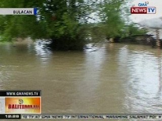 Hanggang dibdib na baha, resulta ng malakas na ulan at pagpapakawala ng tubig ng Bustos Dam