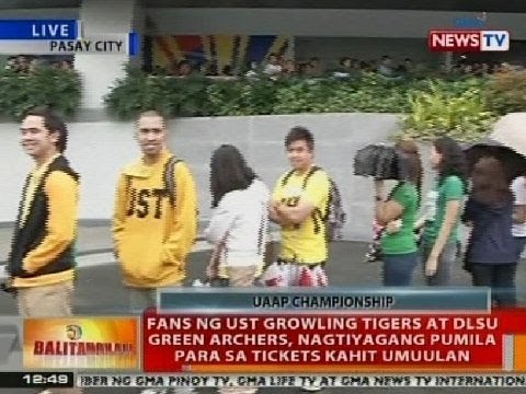 Fans ng UST Growling Tigers at DLSU Green Archers, nagtiyagang pumila para sa tickets kahit umuulan