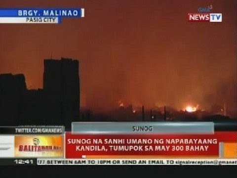 Sunog na sanhi umano ng napabayaang kandila, tumupok sa may 300 bahay