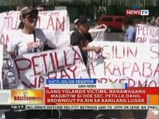 Ilang Yolanda victims, nanawagang magbitiw si DOE Sec. Petilla
