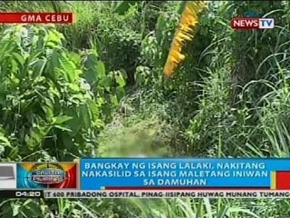 Bangkay ng isang lalaki, nakitang nakasilid sa isang maletang iniwan sa damuhan sa Cebu City