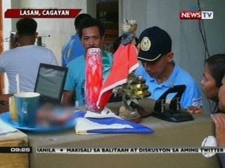 Mga tauhan ng NBI na sumalakay sa diumano'y pugad ng jueteng, dinala sa presinto ng mga pulis