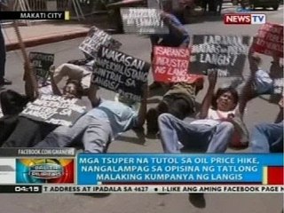 Mga tsuper na tutol sa oil price hike, nangalampag sa opisina ng 3 malalaking kumpanya ng langis