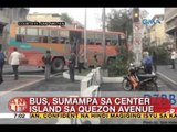 UB: Bus, sumampa sa center island sa Quezon Avenue