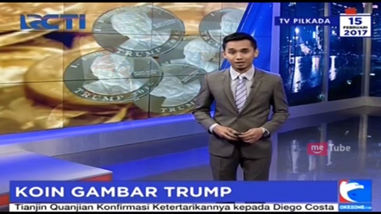 Koin Perak Bergambar Wajah Trump