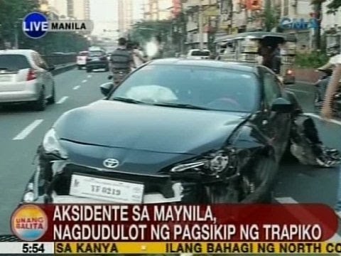 UB: Kotse, sumalpok sa steel railings ng center island sa España, Manila